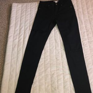 Black skinny jeans with holes